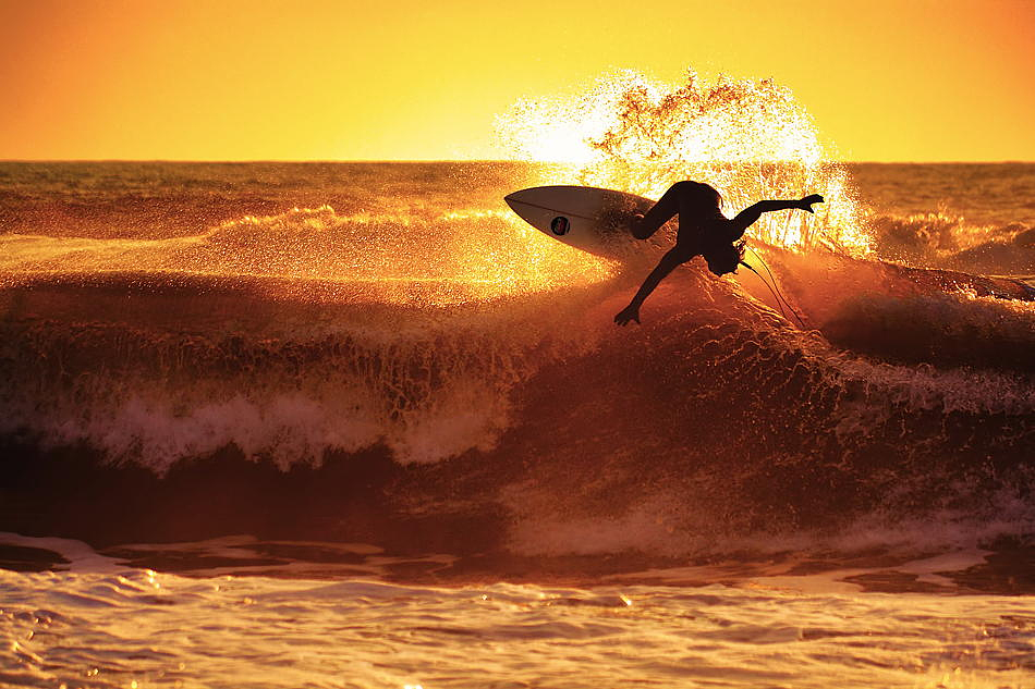 Surfing on a Sri Lanka beach